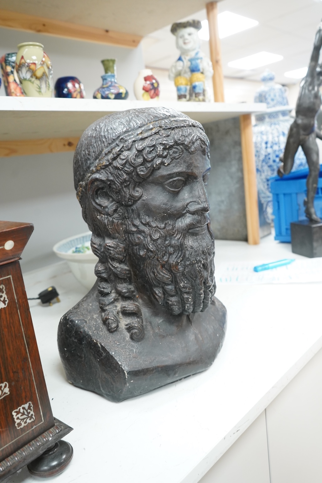 A composition bust of a bearded Greek gentleman, 45cm high